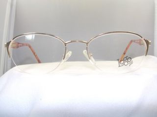  semi rimless eyeglass frame model 1401 in gold with tortoise temples
