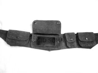 The belt has 4 pockets on the outside, secured with brass closure and