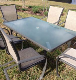 Very Nice Patio Table with 6 Comfortable Chairs