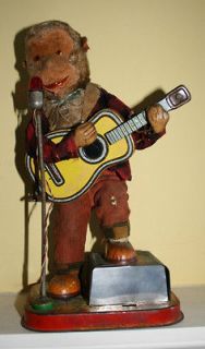 Vintage Toy Rock and Roll Monkey Playing Guitar As seen on American