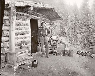 Pikes Peak gold prospector St. Peters CO mountain log cabin camp
