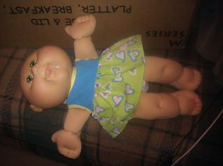 Cabbage Patch doll with diaper and dress baby is bald Blue eyes