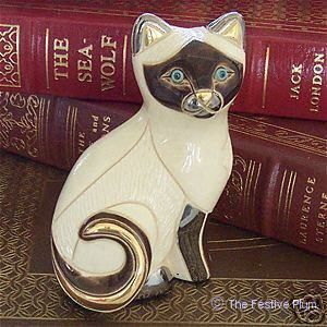silver cat figurine
