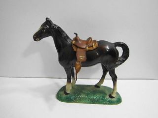 STANDING HORSE EMPTY SADDLE WITH LEATHER SADDLE DENVER COLO