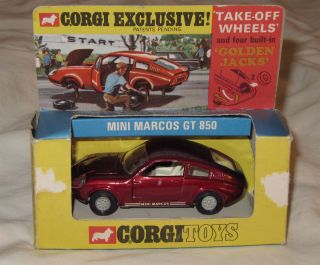 Corgi Exclusive MINI MARCOS GT 850 w/take off wheels  143 scale  red