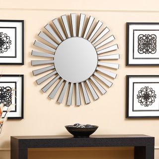 Abbyson Living Soleil Round Wall Mirror (SilverMaterials: Glass/woodCare: Dust all non mirror surfaces with a dry, soft, cloth. Clean mirrored surfaces with glass cleanerDimensions: 31.5 inches diameter x 0.75 inches deep )